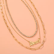 Monogram pendants, multi-layer necklaces,